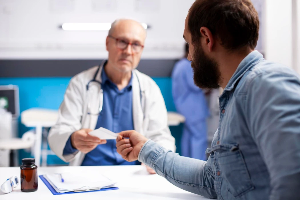 Patient receiving prescription paper