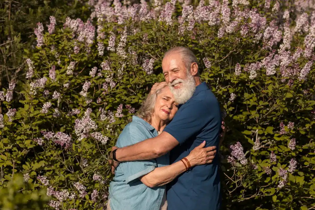 Medium shot happy couple hugging